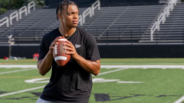 Justin Fields models Reebok's football gear.